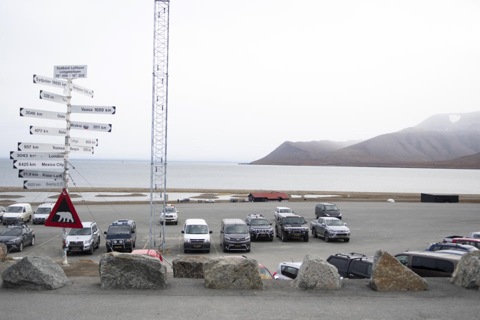 A parking area part of the Longyearbyen camp site, near red roof at centre, after a polar bear attacked the site and killed a man in Norway's remote Svalbard Islands in the Arctic, Friday Aug. 28, 2020. The polar bear was killed. The man, who wasn't identified, was rushed to hospital in the main settlement where he was declared dead Friday. (Line Nagell Ylvisaker / NTB scanpix via AP)