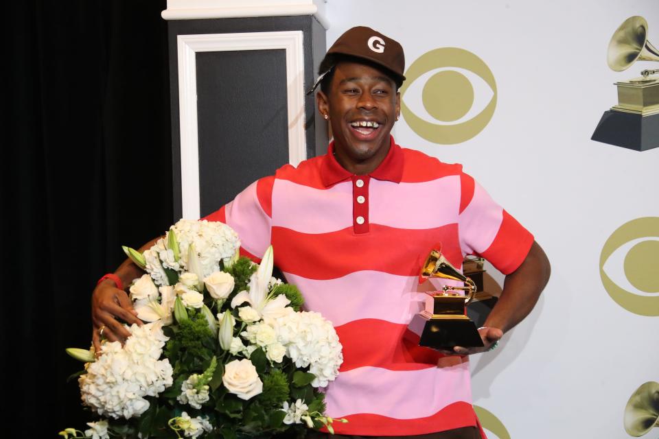 Tyler, the Creator poses with his Grammy for best rap album ("Igor") backstage at the 62nd annual Grammy Awards ceremony.