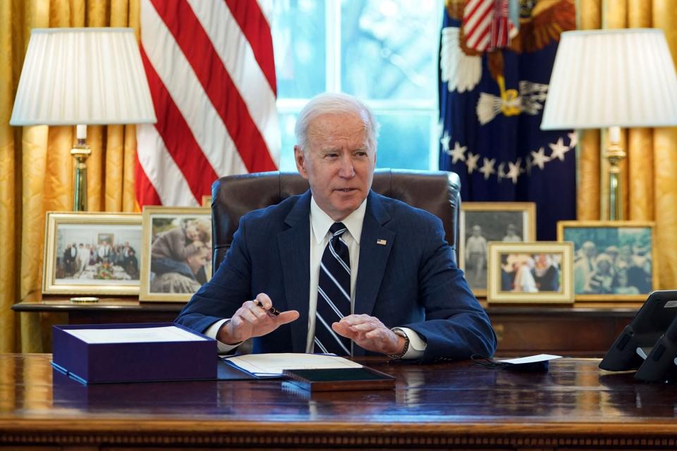 Joe Biden signs the American Rescue Plan on March 11, 2021