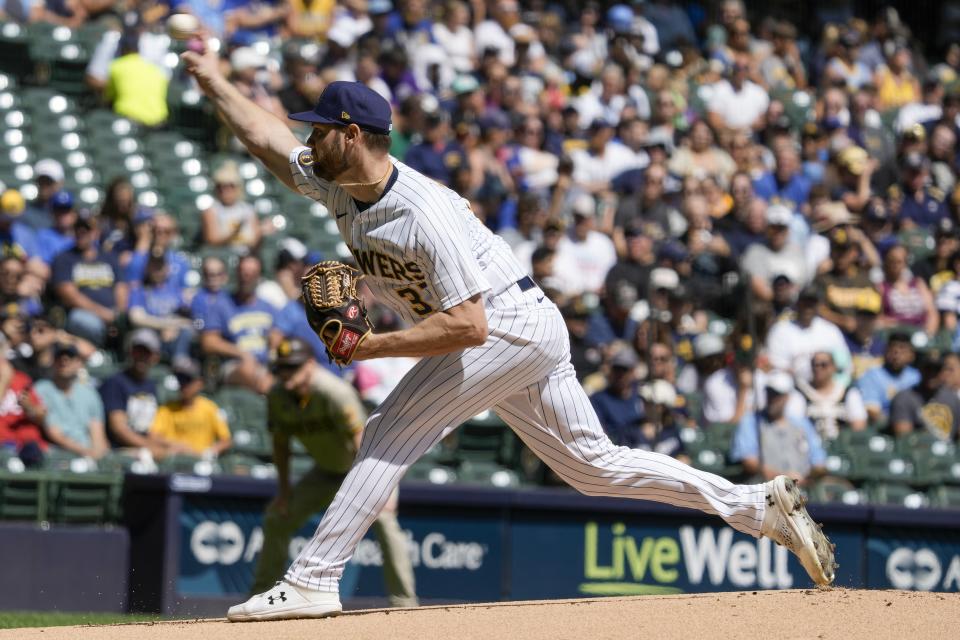 Milwaukee Brewers starting pitcher Adrian Houser throws during the first inning of a baseball game against the San Diego Padres Sunday, Aug. 27, 2023, in Milwaukee. (AP Photo/Morry Gash)