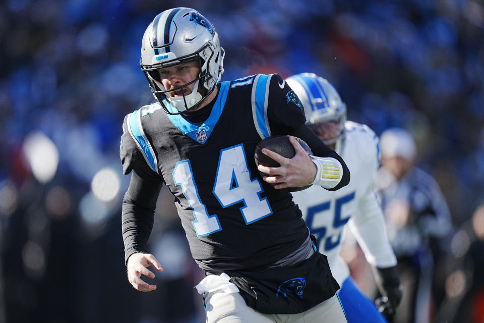 Carolina Panthers quarterback Sam Darnold runs for a touchdown during the first half of an NFL football game between the Carolina Panthers and the Detroit Lions on Saturday, Dec. 24, 2022, in Charlotte, N.C. (AP Photo/Rusty Jones)