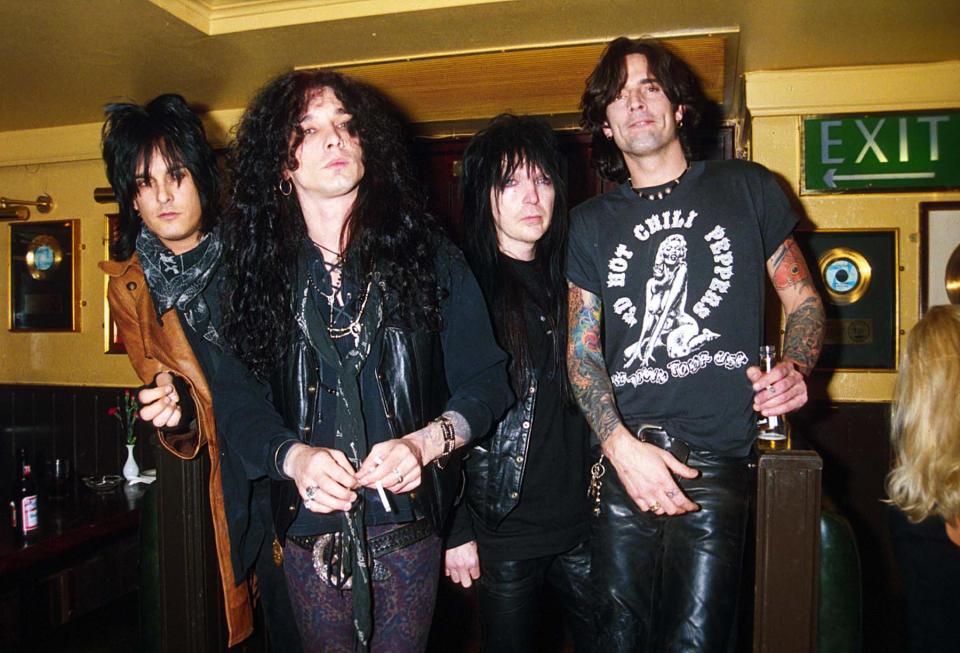 UNITED KINGDOM - CIRCA 1994:  (L to R) Nikki Sixx, John Corabi, Mick Mars and Tommy Lee of Motley Crue pose at the Hard Rock Cafe, February 1994, in London, England.  (Photo by Dave Benett/Getty Images)