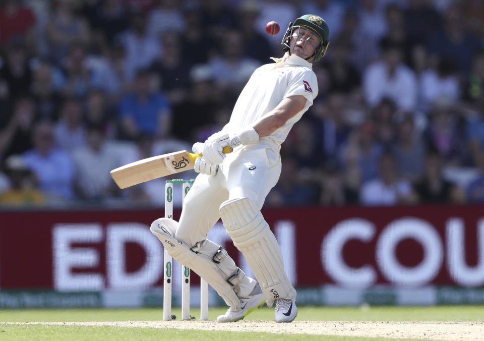 Australia's Marnus Labuschagne avoids a bouncer while batting during play on day three of the third Ashes Test cricket match between England and Australia at Headingley cricket ground in Leeds, England, Saturday, Aug. 24, 2019. (AP Photo/Jon Super)