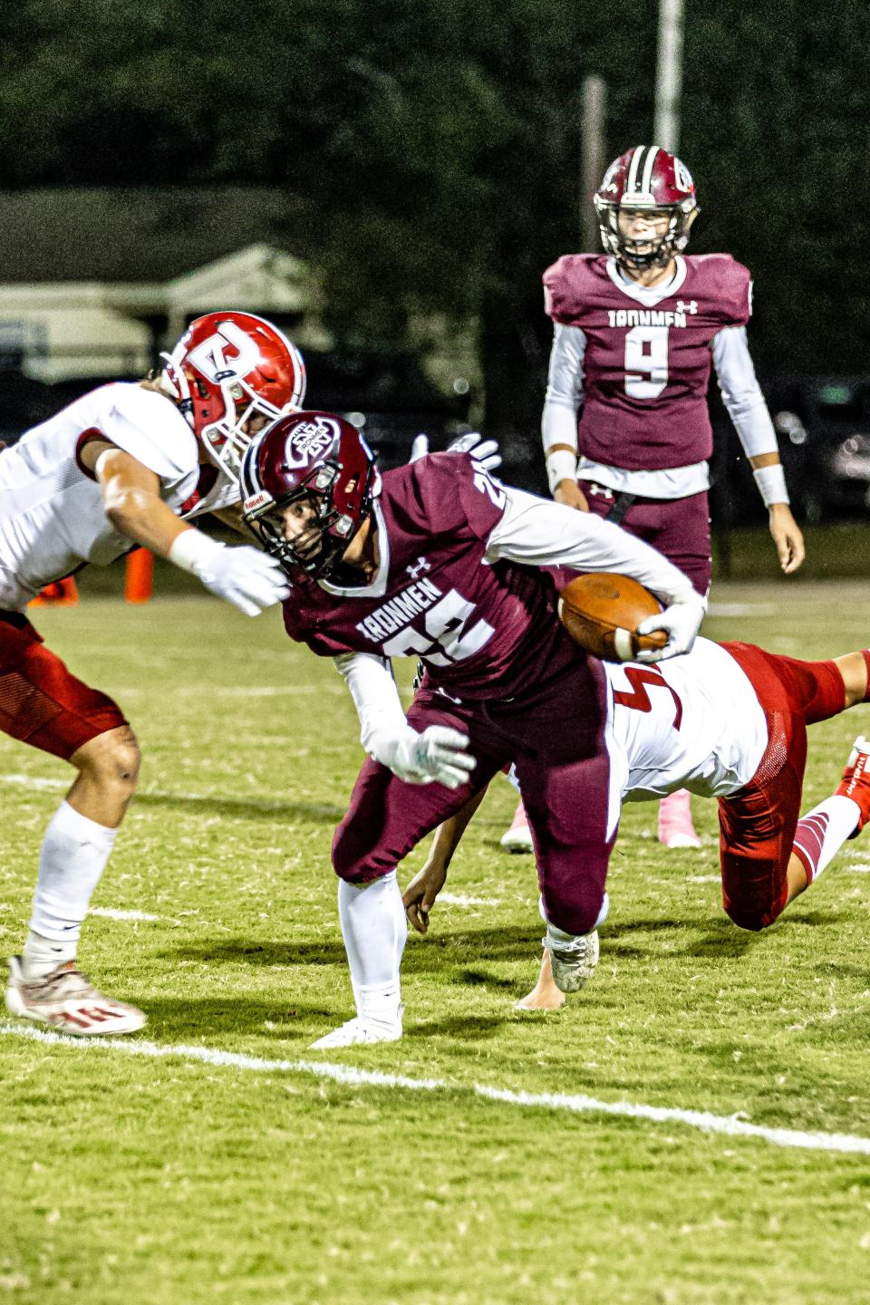 Nowata's Brayden Humphiries slips Dewey's defense during last season's Dewey vs. Nowata showdown.