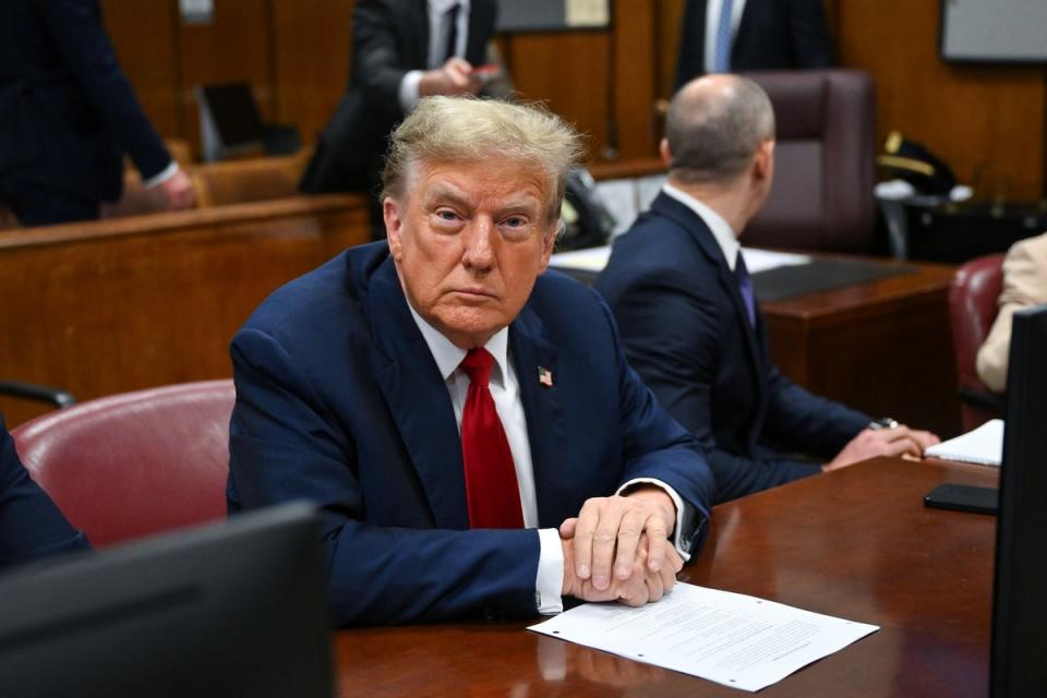 Former President Donald Trump attends the first day of his trial at Manhattan Criminal Court (AP)