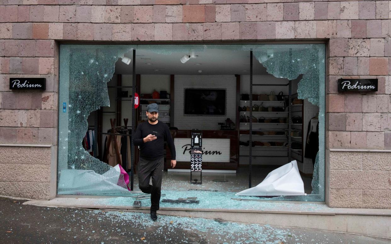 A bomb damaged store in the street of central Stepanakert in Nagorno-Karabakh following missile attacks by Azerbaijani forces - Julian Simmonds