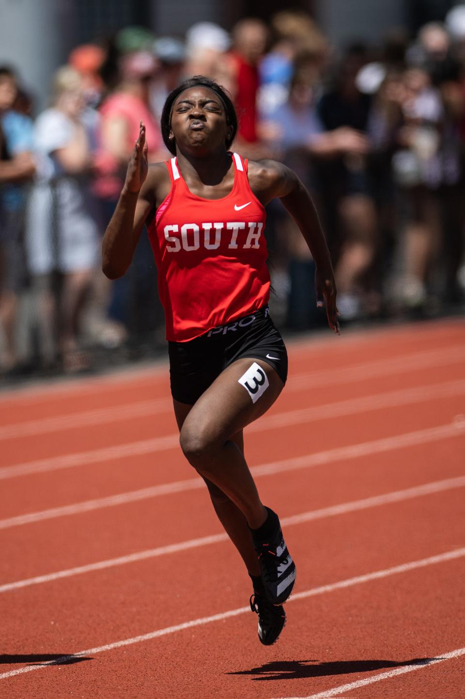 South senior Ciara Adu-Addo competes in the 100 during Saturday's District E Division 1 Class Championships.