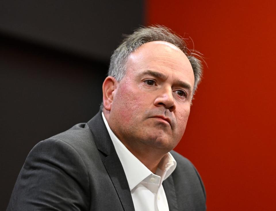 Pierre Dorion, seen above in 2022, was fired as general manager of the Ottawa Senators on Wednesday after the team was docked a first-round pick over a botched 2022 trade with the Vegas Golden Knights. (Justin Tang/The Canadian Press - image credit)