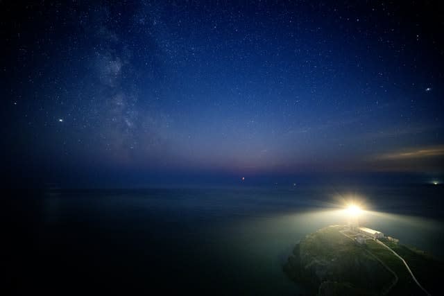 The Milky Way seen behind South Stack lighthouse