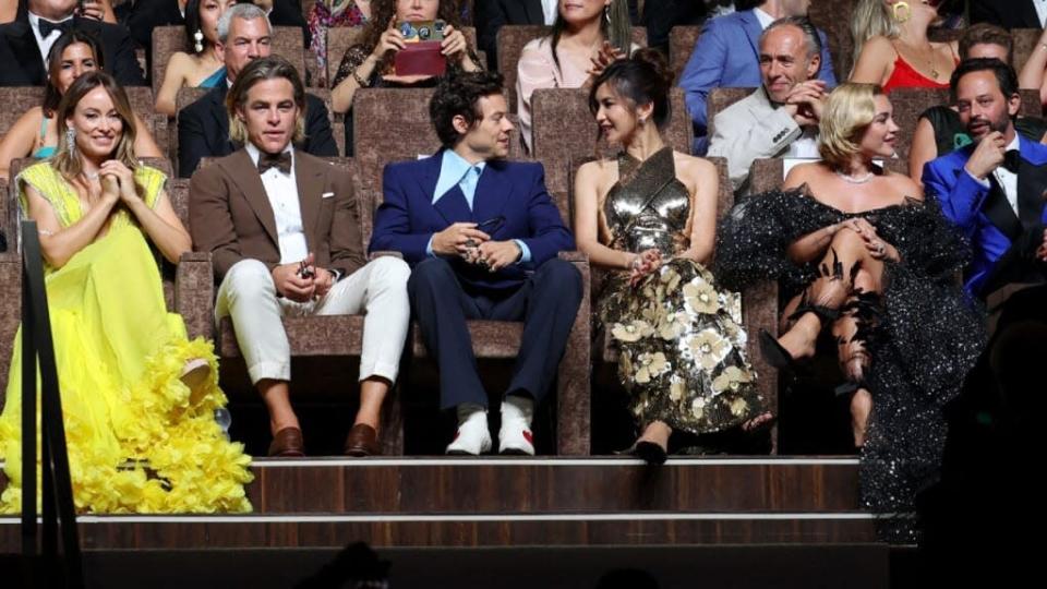 From left to right: Director Olivia Wilde and cast members Chris Pine, Harry Styles, Gemma Chan, Florence Pugh and Nick Kroll at the film's screening at the 2022 Venice Film Festival