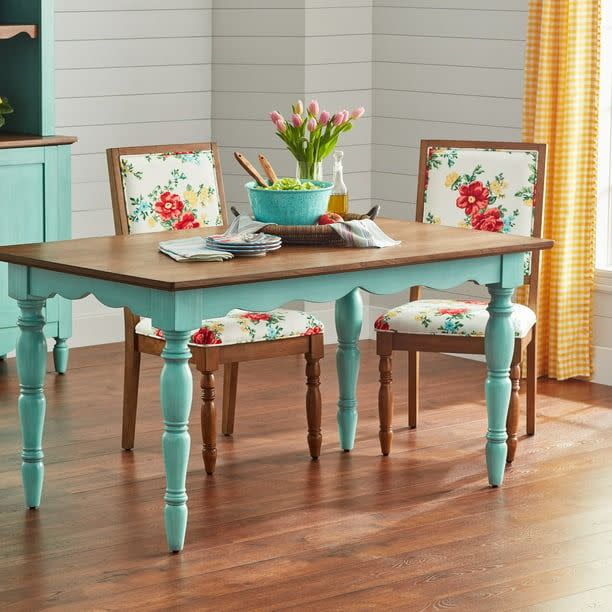 <p><a href="https://go.redirectingat.com?id=74968X1596630&url=https%3A%2F%2Fwww.walmart.com%2Fip%2FThe-Pioneer-Woman-Dining-Table-Teal%2F1893267421&sref=https%3A%2F%2Fwww.thepioneerwoman.com%2Fhome-lifestyle%2Fdecorating-ideas%2Fg43216159%2Fwalmart-farmhouse-style-furniture%2F" rel="nofollow noopener" target="_blank" data-ylk="slk:Shop Now;elm:context_link;itc:0;sec:content-canvas" class="link ">Shop Now</a></p><p>The Pioneer Woman Dining Table</p><p>walmart.com</p><p>$268.00</p><span class="copyright">Walmart</span>