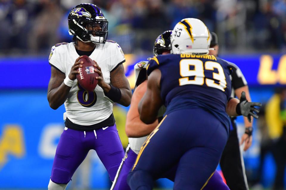Baltimore Ravens quarterback Lamar Jackson (8) drops back to pass against the Los Angeles Chargers.