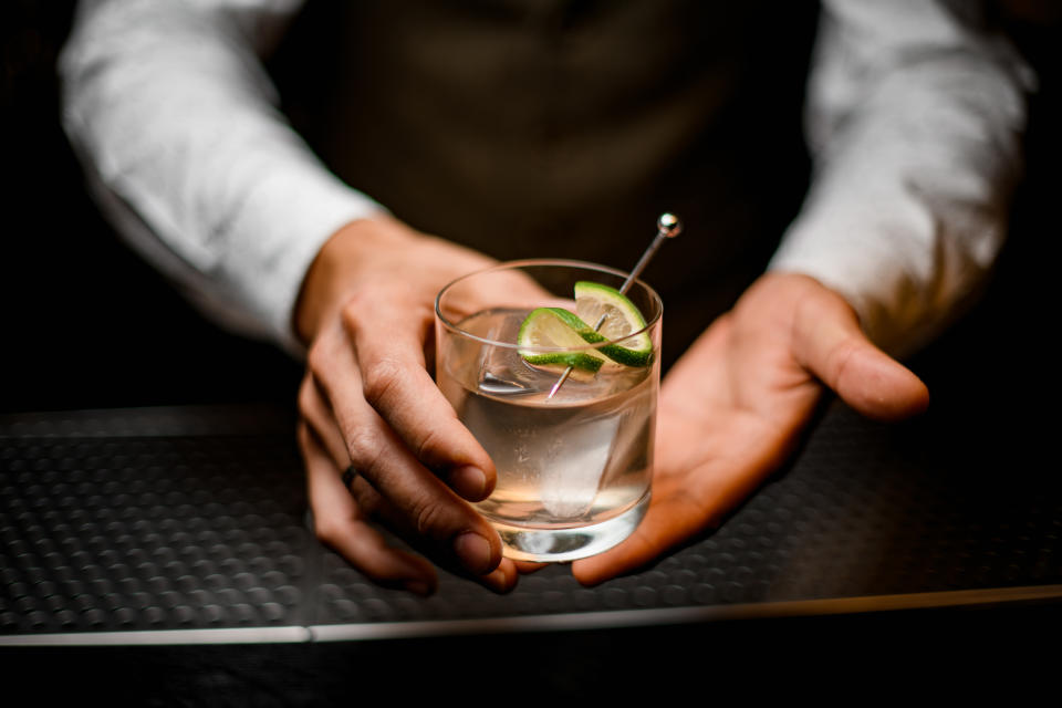 Man holding cocktail glass