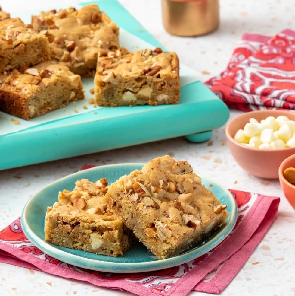 blondies with nuts on blue plate