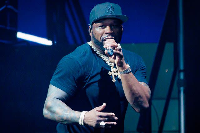 <p>Sergione Infuso/Corbis via Getty</p> 50 Cent performs in Milan, Italy in October 2023