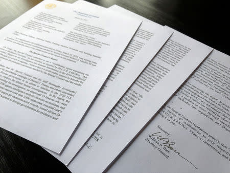 FILE PHOTO: U.S. Attorney General William Barr's signature is seen at the end of his four-page letter to U.S. congressional leaders on the conclusions of Special Counsel Robert Mueller's report on Russian meddling in the 2016 election after the letter was released by the House Judiciary Committee in Washington, U.S. March 24, 2019. REUTERS/Jim Bourg/File Photo