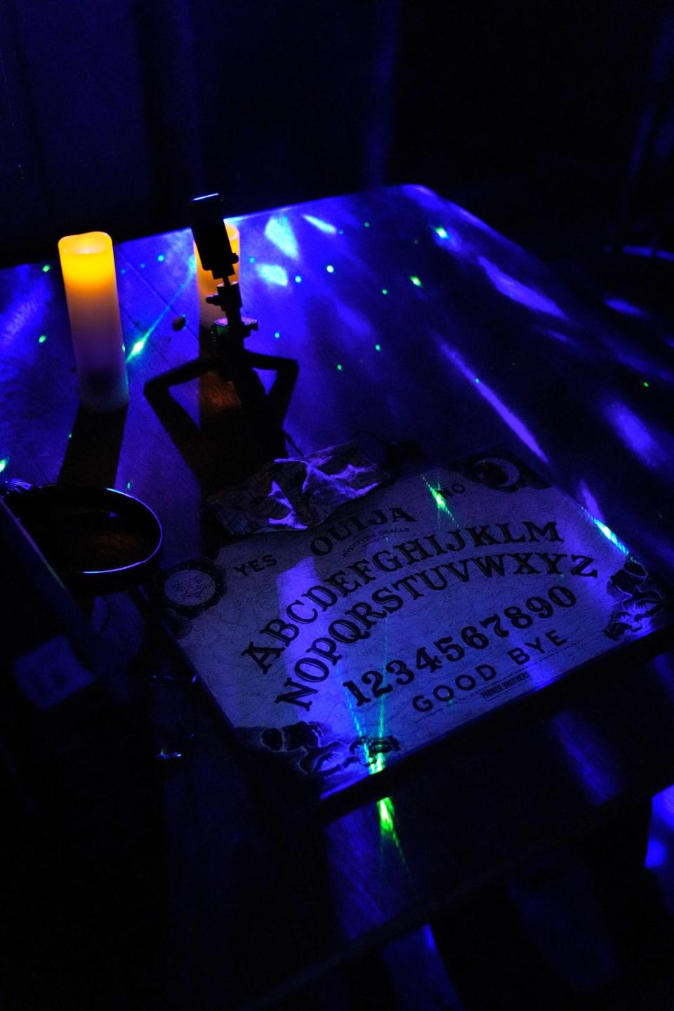 A Ouija board in a basement room of the "Conjuring" house.