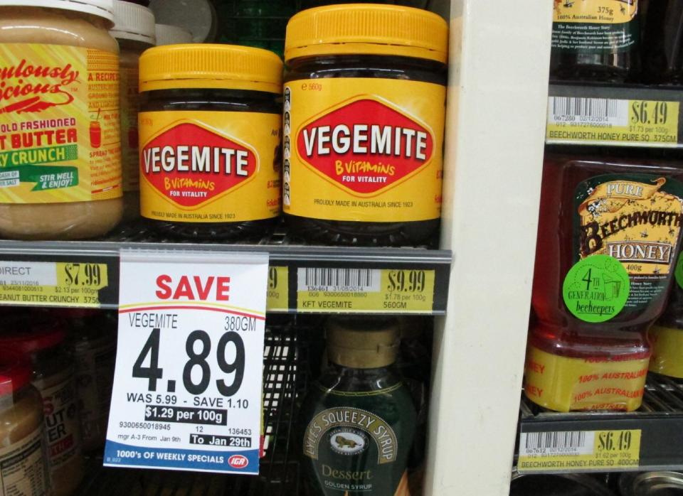 Vegemite are sold at a supermarket in Canberra, Australia, Thursday, Jan. 19, 2017. The salty, brown spread beloved in Australia, is going home, purchased by an Australian dairy company from the maker of Oreos. Mondelez International Inc. says it is selling Vegemite and other Australian and New Zealand grocery products to Bega Cheese in a deal worth about $345.3 million (460 Australian dollars). (AP Photo/Rod McGuirk)