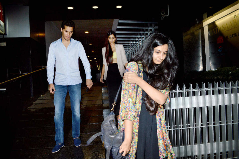 After a night out at dinner with her sister Rhea, Sonam Kapoor was spotted leaving a Mumbai restaurant with a mystery man. While we know she's not dating anyone, we're left wondering who this striking young gentleman is?