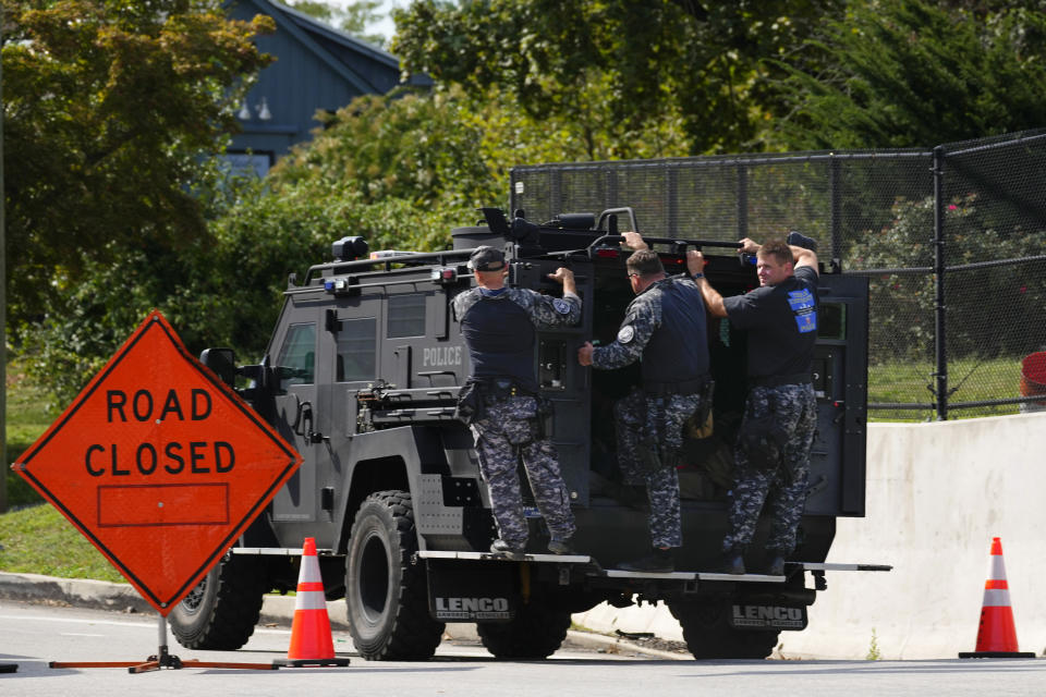 FILE - Law enforcement officers ride by a roadblock as the search for escaped convict Danilo Cavalcante continues in Pottstown, Pa., Tuesday, Sept. 12, 2023. Cavalcante, a convicted murderer who escaped from a southeastern Pennsylvania prison earlier this year and eluded a massive two-week search before he was recaptured, was arraigned Friday, Feb. 2, 2024, on theft, burglary and other charges in connection with alleged crimes committed while he was on the run. (AP Photo/Matt Rourke, File)