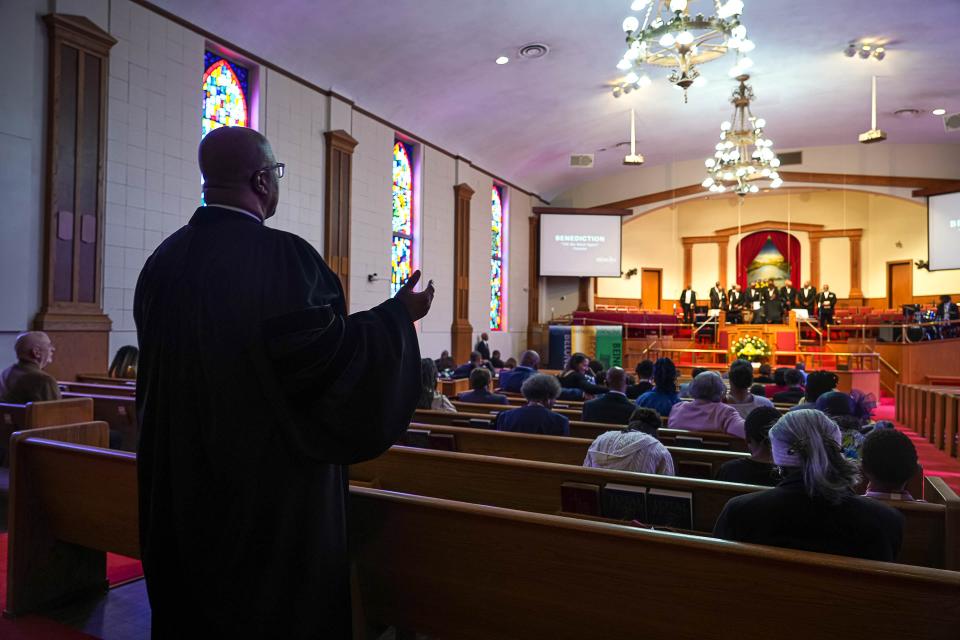 Pastor Ricky Freeman leads the congregation in a final prayer as the April 21 service ends at Ebenezer Third Baptist Church.