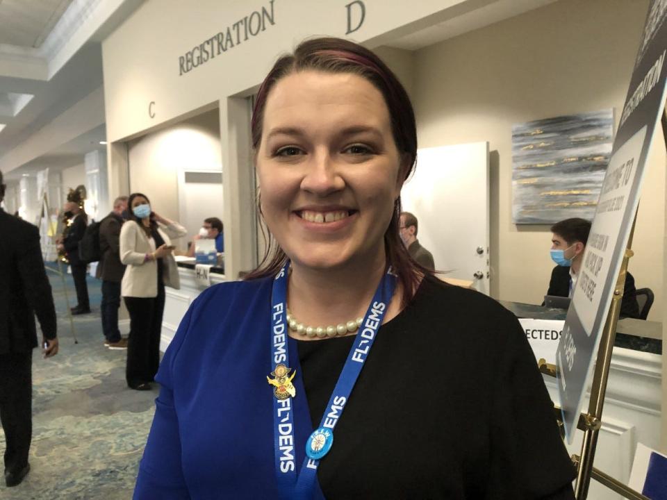 Taylor Aguilera, a voter registration trainer for the Tampa Bay area Democrats, is pictured at the Rosen Plaza in Orlando on Dec. 4, 2021, where she spoke at the Leadership Blue convention.