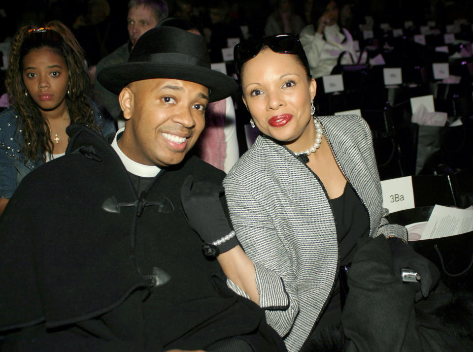 Reverend Run and Justine Simmons during Olympus Fashion Week Fall 2004 - Baby Phat - Front Row and Backstage at Gotham Hall in New York City, New York, United States. (Photo by Johnny Nunez/WireImage)