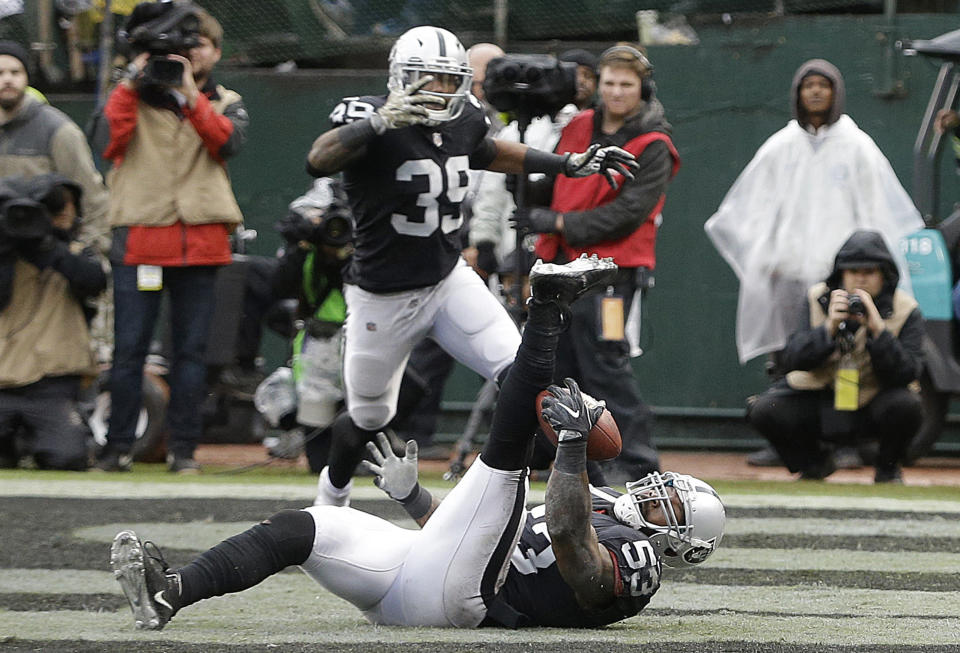 Raiders linebacker NaVorro Bowman made a nifty INT of the Broncos on Sunday. (AP) 