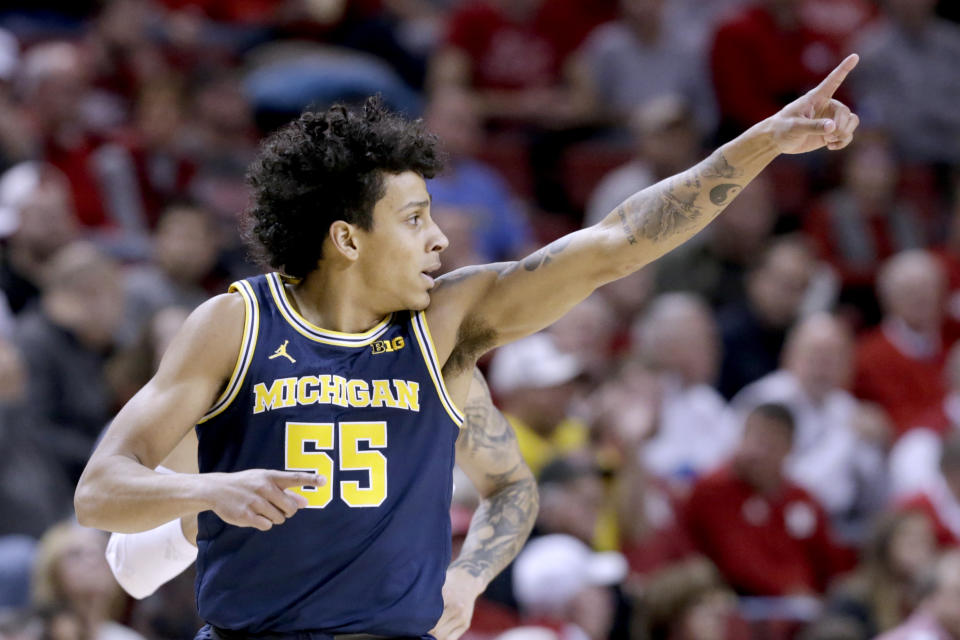 Michigan's Eli Brooks (55) celebrates after scoring a three-point shot during the first half of an NCAA college basketball game against Nebraska in Lincoln, Neb., Tuesday, Jan. 28, 2020. (AP Photo/Nati Harnik)