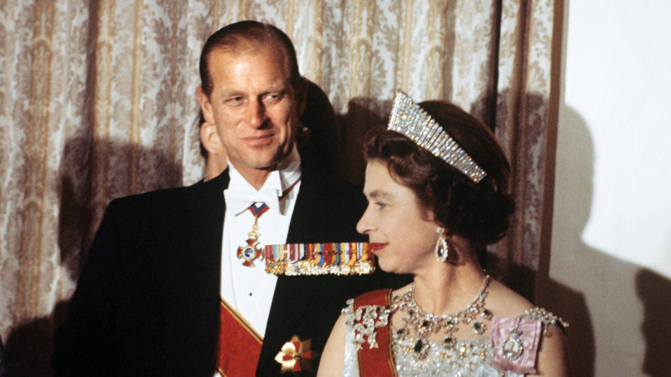 Queen Elizabeth II and her husband, Prince Philip, at a banquet in honor of West German President Gustav Heinemann, October 1972, in London. / Credit: Heinrich Sanden/picture alliance via Getty Images
