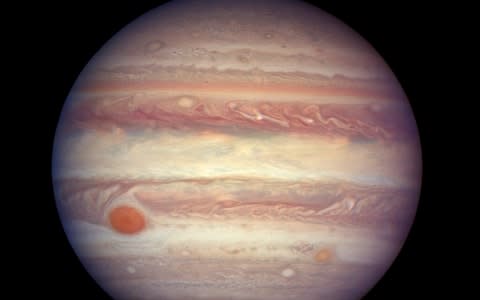 Scientists have concluded it survived by orbiting the sun exactly in step with Jupiter, but in the opposite direction - Credit: NASA / ESA