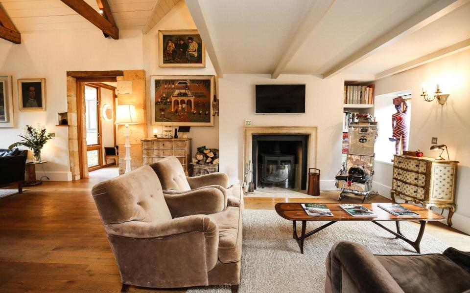 The cosy living room at Temple Guiting Barn in Gloucestershire