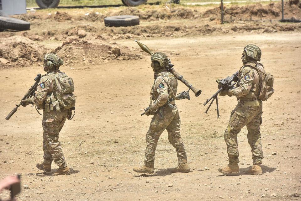 Hezbollah fighters take part in a large-scale military exercise in Aaramta, Lebanon, on the border with Israel, on May 21, 2023. <em>Photo by Fadel Itani/NurPhoto via Getty Images</em>