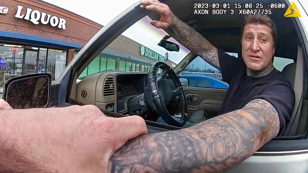 Jason Cornett is shown in this screenshot from a bodycam video at the time of his arrest in March.