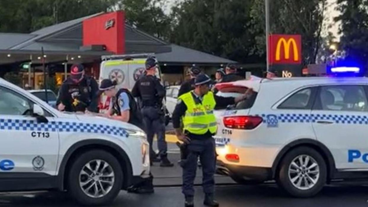 A man has been arrested after a NSW Ambulance paramedic was stabbed in Campbelltown this morning., About 5.30am (Friday 14 April 2023) officers from Campbelltown Police Area Command were called to a McDonalds on Queen Street. PICTURE: TNV