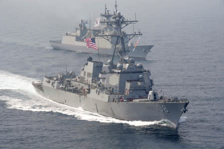 FILE PHOTO: The U.S. Navy Arleigh Burke-class guided-missile destroyer USS Wayne E. Meyer sails alongside South Korean multirole guided-missile destroyer Wang Geon
