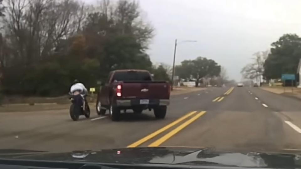 Fleeing Motorcyclist Taken Out By Bystander In Truck