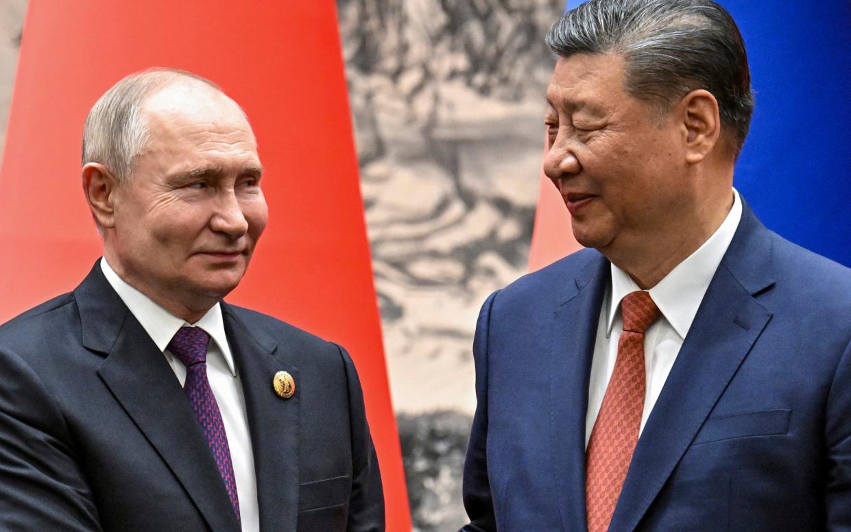 Vladimir Putin and Xi Jinping meet in Beijing in May 2024