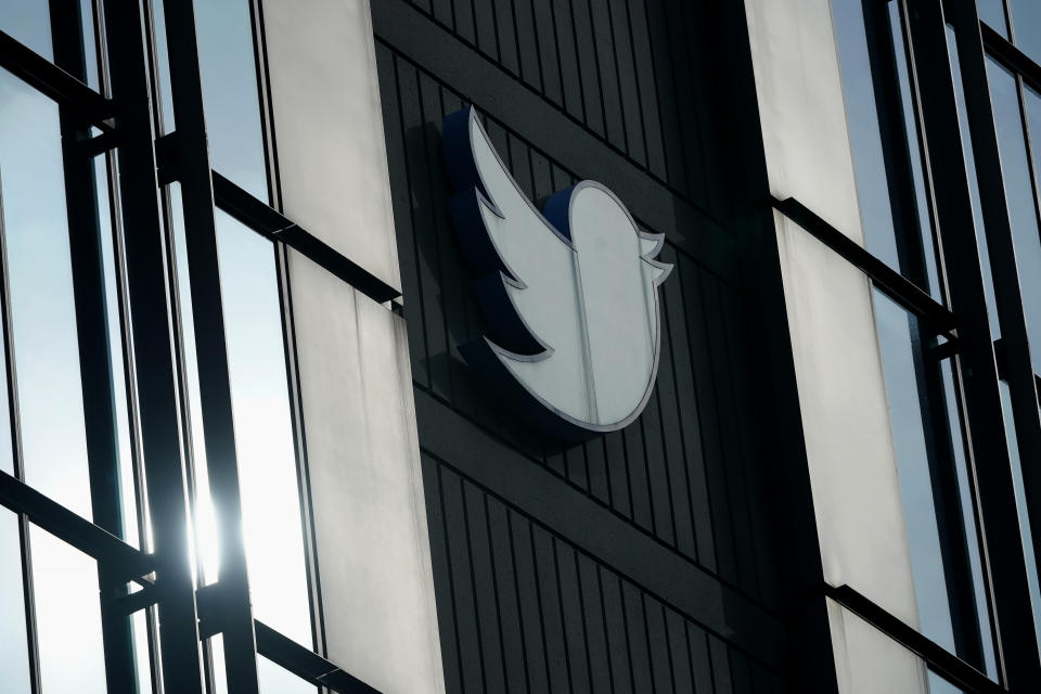 FILE - A Twitter logo hangs outside the company's offices in San Francisco, on Dec. 19, 2022. Twitter has labeled National Public Radio (NPR) as “state-affiliated media” on the social media site Wednesday, April 5, 2023, a move some worried could undermine public confidence in the news organization. (AP Photo/Jeff Chiu, File)
