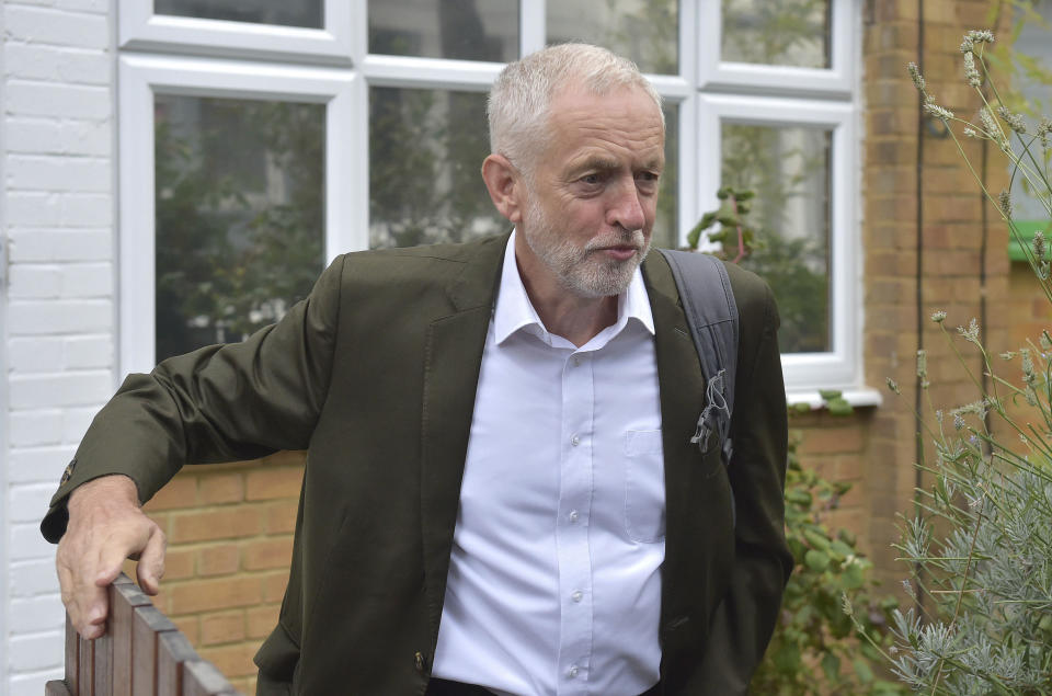 Britain's Labour party leader Jeremy Corbyn leaves his house in London ahead of a meeting of the party's National executive Committee, in London, Tuesday Sept. 4, 2018. Labour's ruling body will decide whether to fully adopt an international definition of anti-Semitism as the row over the party's response to the problem continued to simmer. (Nick Ansell/PA via AP)