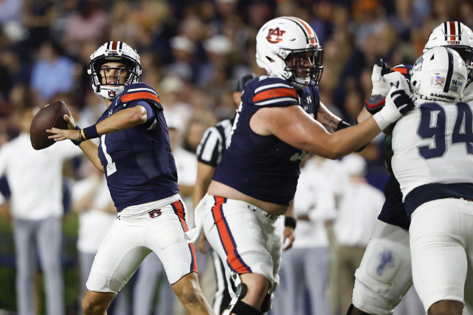 Auburn quarterback Payton Thorne (1) looks to throw a pass during the first half of an NCAA college football game against Samford, Saturday, Sept. 16, 2023, in Auburn, Ala. (AP Photo/Butch Dill)