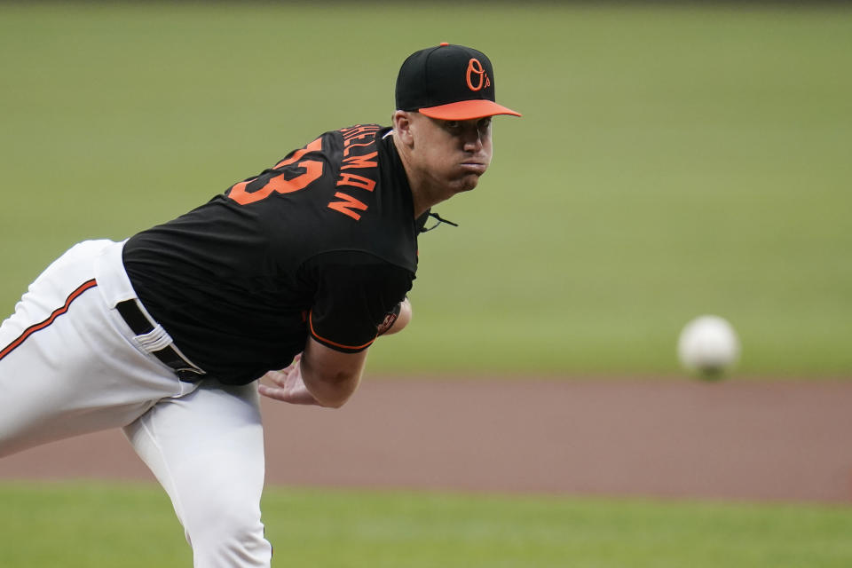 Baltimore Orioles starting pitcher Thomas Eshelman throws a pitch to the Toronto Blue Jays during the first inning of a baseball game, Friday, June 18, 2021, in Baltimore. (AP Photo/Julio Cortez)