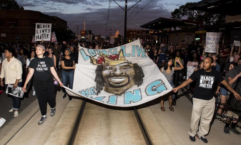 Protestors carry a banner depicting Philando Castile on in 2017 in neighboring St Paul, Minnesota.