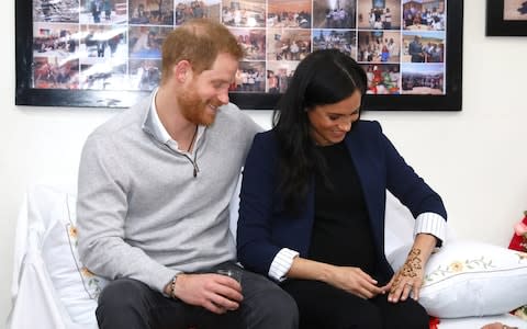  Prince Harry, Duke of Sussex and Meghan, Duchess of Sussex during a Henna ceremony - Credit: Getty&nbsp;