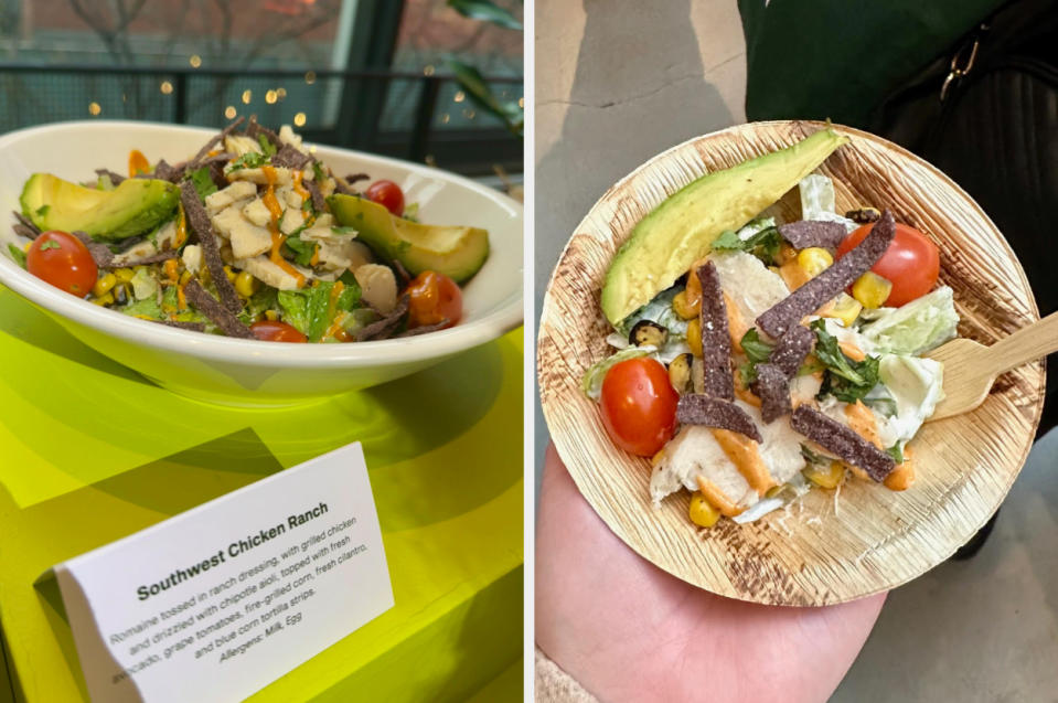 Person holding a bowl of Southwest chicken salad with avocado slices and a wooden fork