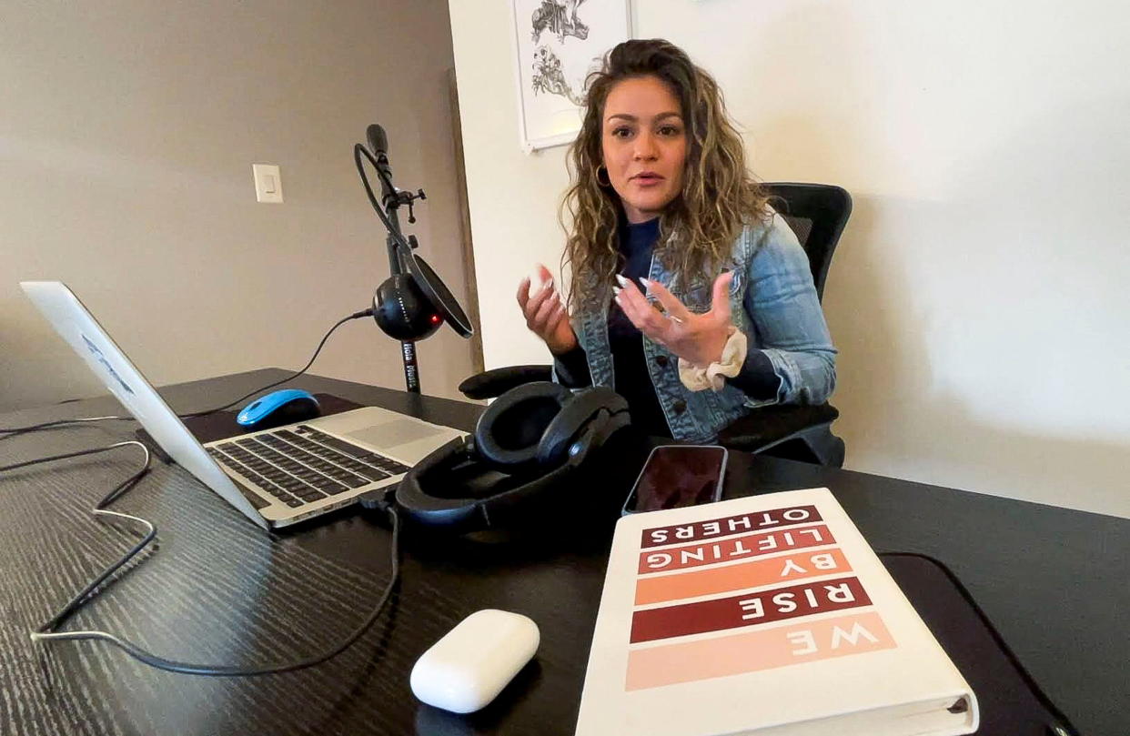 Gabby Ianniello, 28, who quit her job in real estate development last year, works on her podcast, Corporate Quitter, in New York City, U.S. December 10, 2021 in this still image taken from video on December 10, 2021. REUTERS/Aleksandra Michalska
