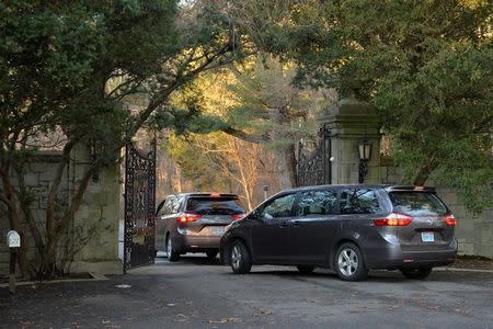 Vehicles enter Killenworth, an estate built in 1913 for George du Pont Pratt and purchased by the former Soviet Union in the 1950's, in Glen Cove, Long Island, New York, U.S., on December 30, 2016. REUTERS/Rashid Umar Abbasi