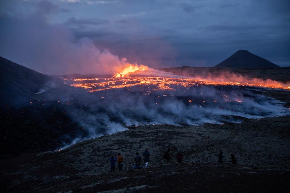 Lava emerges from a fissure of the Fagradalsfjall volcano near the Litli-Hrútur mountain, some 30km (19 miles) southwest of Reykjavik, in July (AP Photo/Marco Di Marco)