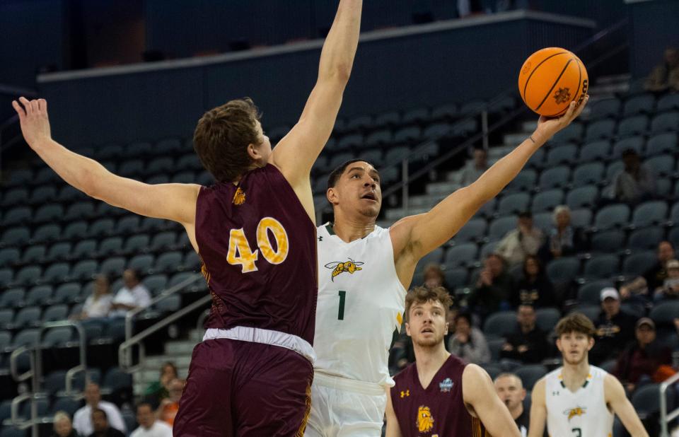 Joel Scott, who was named the 2022-23 Division II men's basketball Player of the Year at Black Hills State, has committed to Colorado State.
