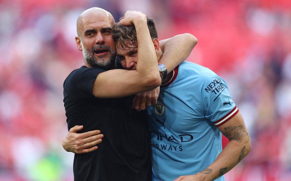 Pep Guardiola and John Stones after the FA Cup final - Diet, sleep and magnesium: what John Stones changed to become City's Barnsley Beckenbauer - Reuters/Carl Recine